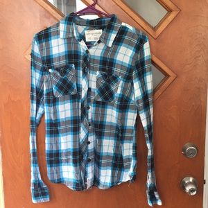 Button up plaid long sleeved shirt